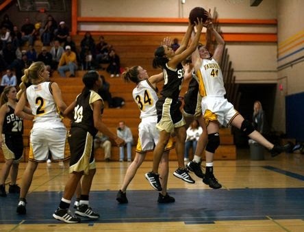 Grossmont High School girls playing a basketball game against a rival team